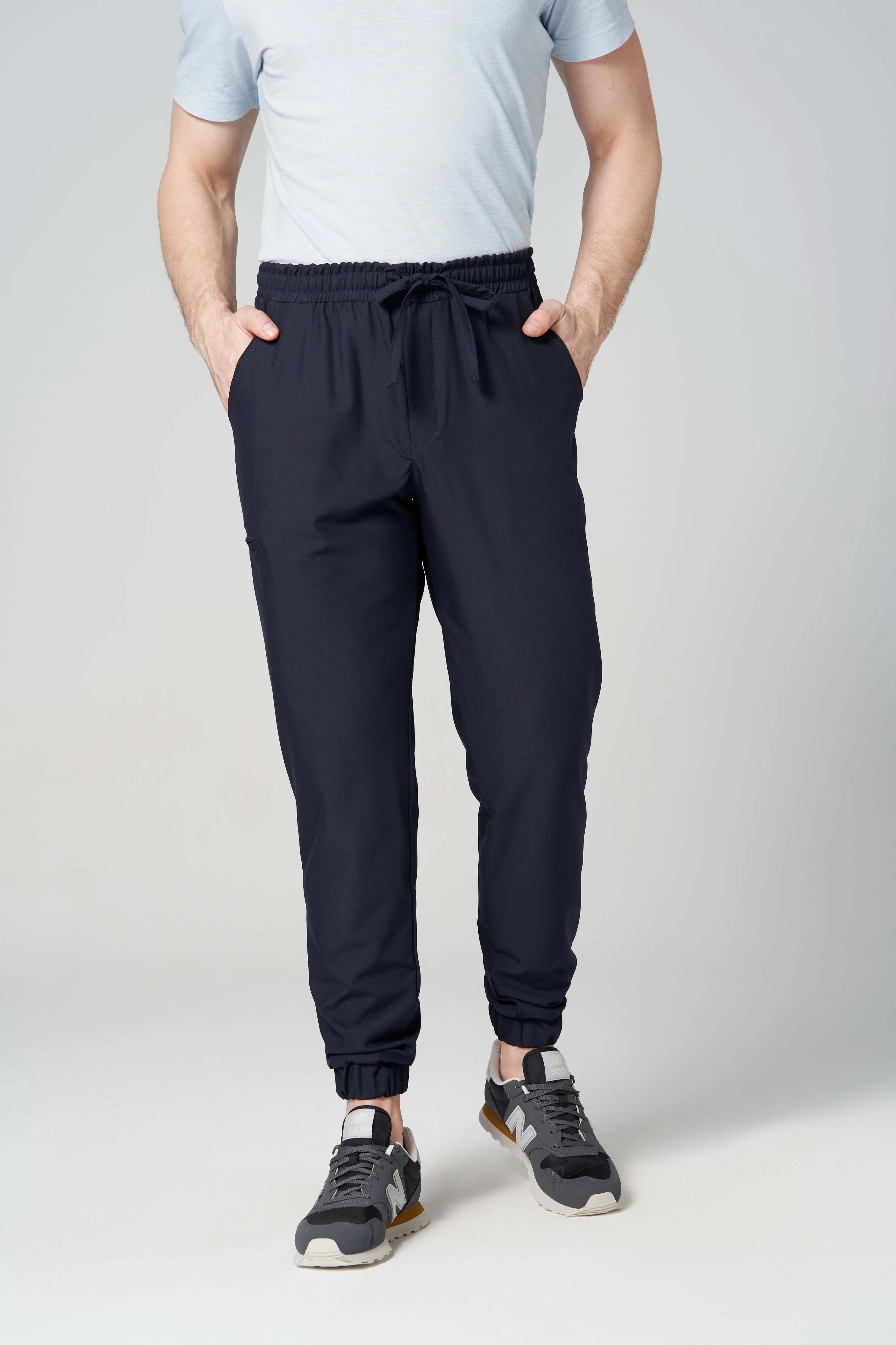 Spodnie medyczne męskie- joggery GENUS ciemny granat (ściągacz materiałowy) widok na przód