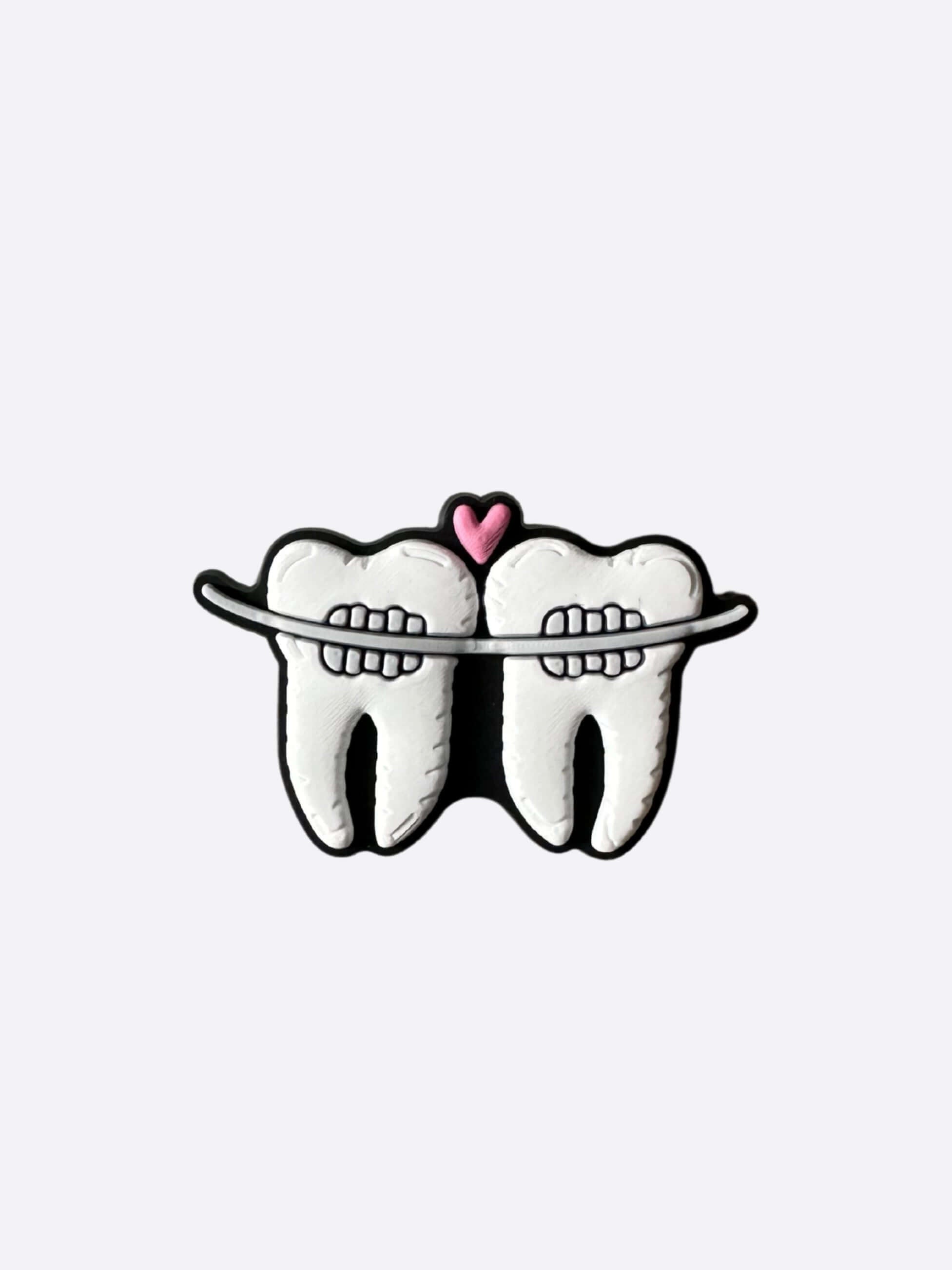 Przypinka do crocsów aparatki